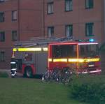 Fire engine, responding to toaster crisis in Telford Court