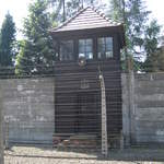 Electrified fence and guard tower at Auschwitz