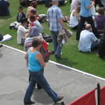 People enjoying Trafalar Sq. Green