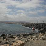 Man fishing on the rocks