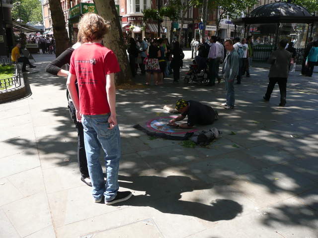 Andrew watching the pavement artist