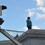 Marion knitting on the plinth