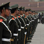 The military all line up in Tiananmen Square for the flag lowering ceremony at sunset