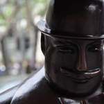 Sculpture of a British Fat cat gentleman outside the City Supermarket Shopping Centre near Jing'An Temple