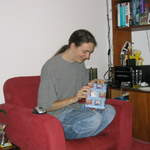Kev opening his present from Ali