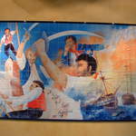 Hand painted tile depicting that pirates and sailors favored Bacardi rum