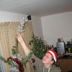 Ali putting the star on the tree