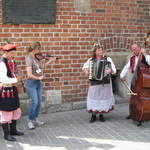Entertainers by the town hall tower