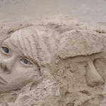 Faces in the sand