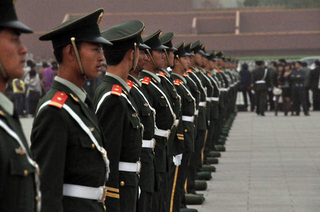 The military all line up in Tiananmen Square for the flag lowering ceremony at sunset