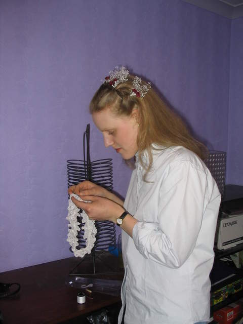 Catherine Martin (bridesmaid and groom's sister) sewing