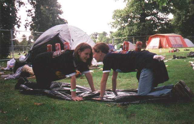 Jen and Alison putting away the tent...