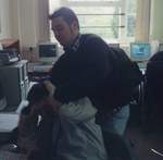 Ben Leah showing Mark Roughan how to scan his face