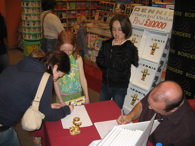 Karen teaching the kids how to draw dogs