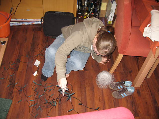 Ali untangling christmas tree lights