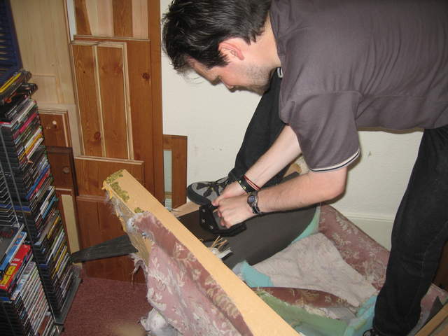 Nick taking apart the chair