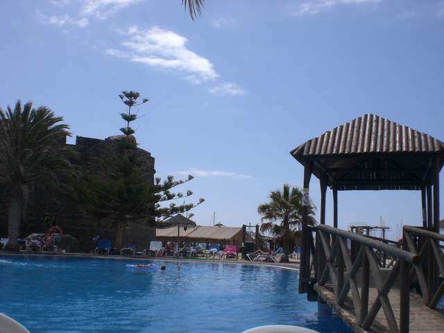 Main pool - the beach is just out of view, over the fence!