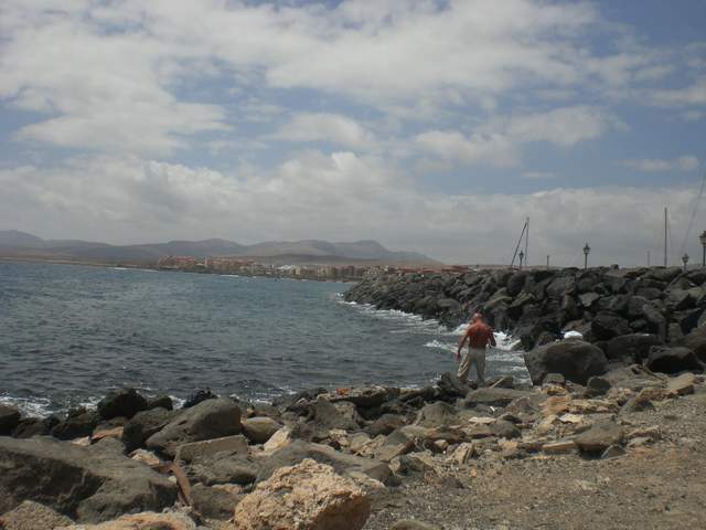 Man fishing on the rocks