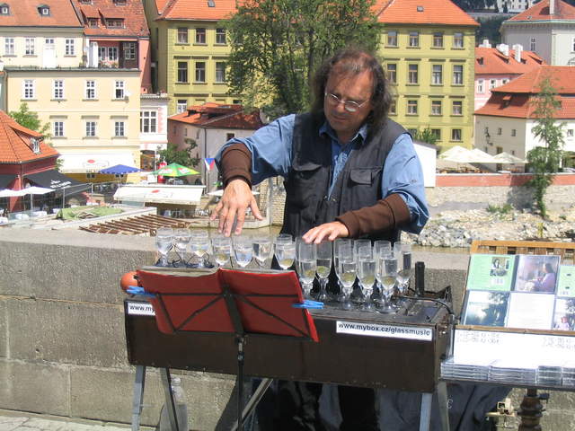 Musician playing wine glasses