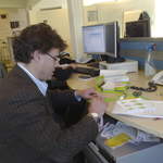 Alastair making a paper christmas tree