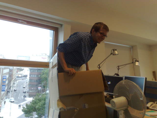 Viktor on a chair in a box