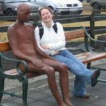 Ali talking to the statue