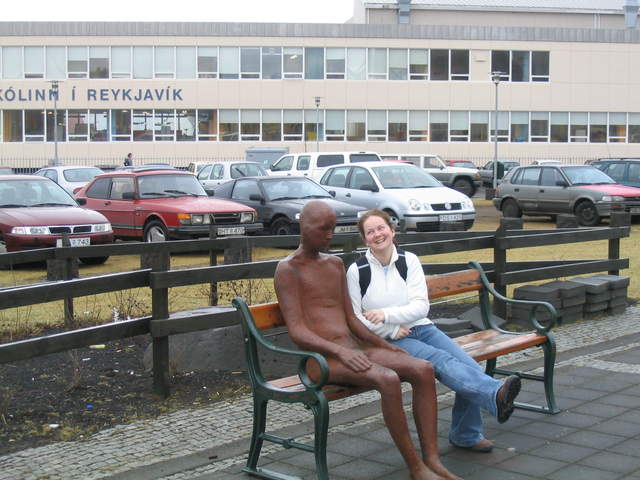 Ali talking to the statue