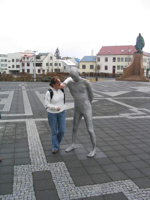 Ali chatting with a statue