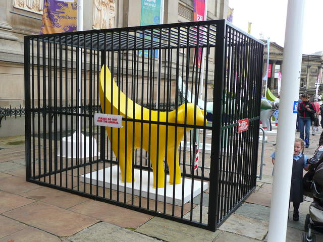 Yellow Superlambanana in a cage