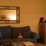 Enjoying the living area of his hotel suite