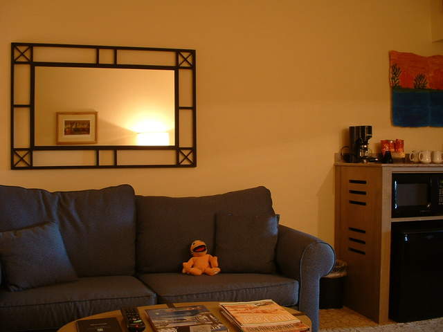 Enjoying the living area of his hotel suite