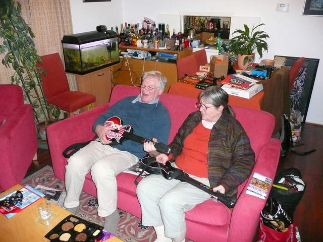 Mum and Dad rocking out with Guitar Hero
