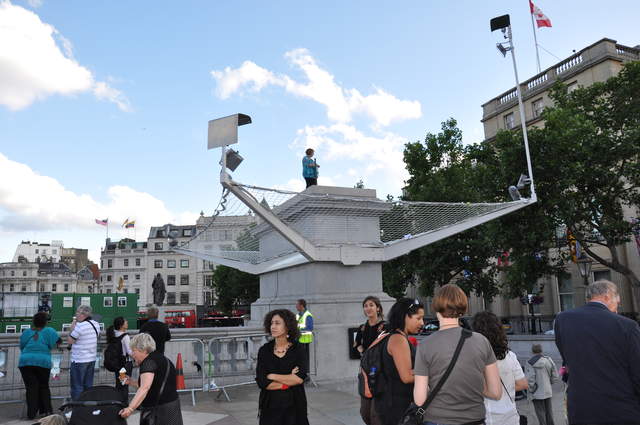 Marion knitting on the plinth