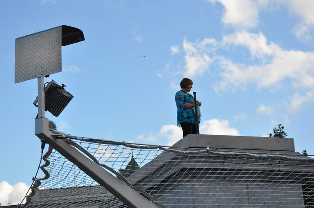Marion knitting on the plinth