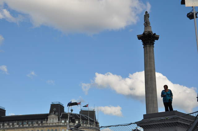 Marion knitting on the plinth