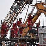 The team working the giant