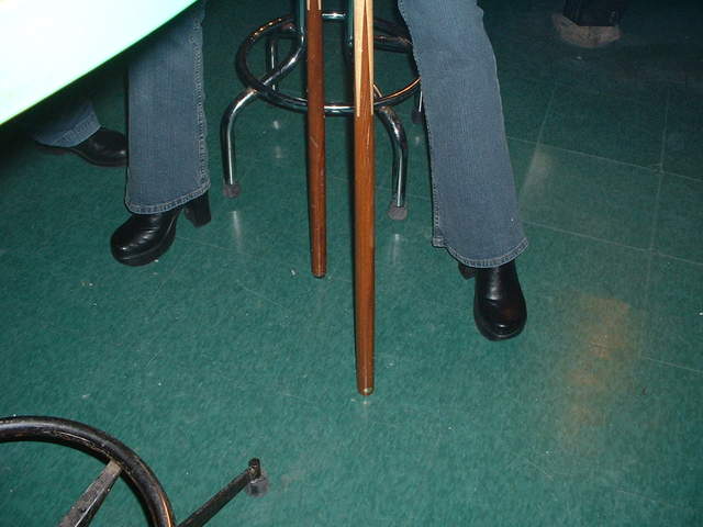 Liz balancing a cue stick