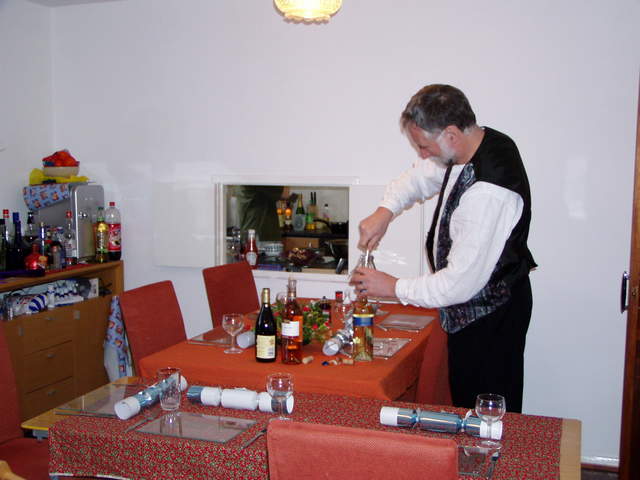 Guy opening wine
