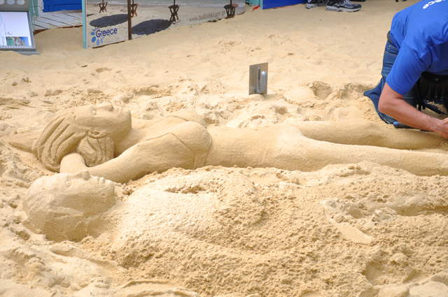Sunbathing sand people